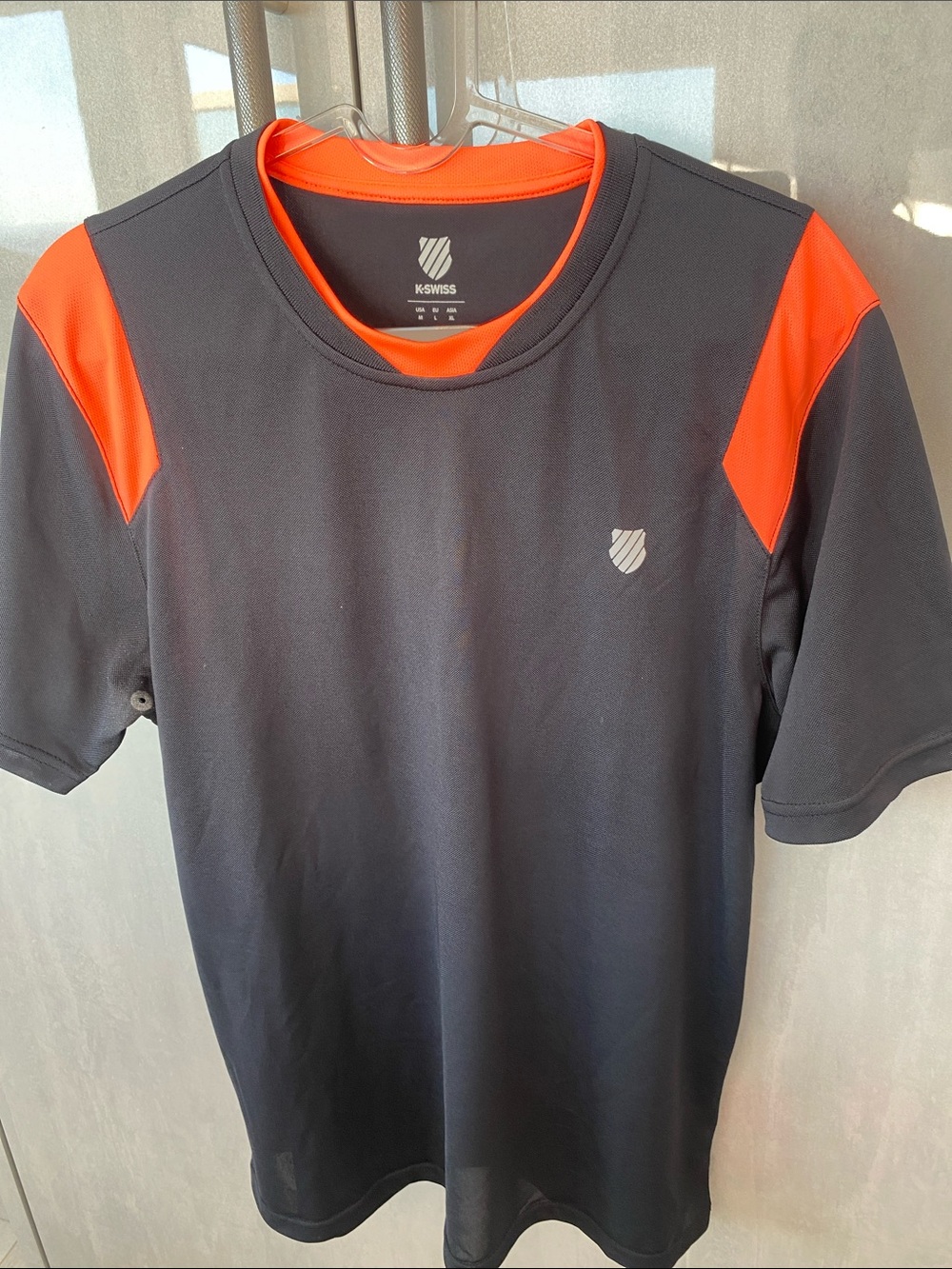 K-Swiss Short-Sleeve Athletic Tee in Black with Orange Accents size M